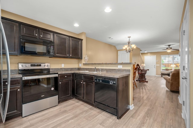 286 Killian Way, Mount Juliet, TN 37122 - kitchen featuring black appliances, a peninsula, light wood-style floors, dark brown cabinetry, and recessed lighting