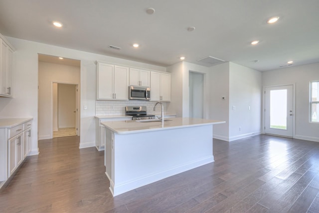 3600 Elene Way, Murfreesboro, TN 37129 - kitchen with appliances with stainless steel finishes, tasteful backsplash, dark wood-style flooring, light countertops, and recessed lighting