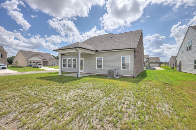 3600 Elene Way, Murfreesboro, TN 37129 - back of property featuring a lawn, roof with shingles, and a patio