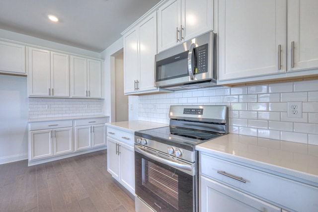 3600 Elene Way, Murfreesboro, TN 37129 - kitchen featuring appliances with stainless steel finishes, dark wood-type flooring, light countertops, white cabinets, and recessed lighting