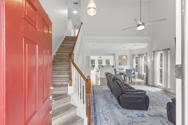 2003 Solomon Ct, Spring Hill, TN 37174 - living area with a high ceiling, wood finished floors, ceiling fan, stairs, and recessed lighting