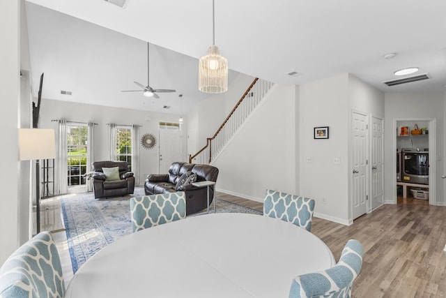 2003 Solomon Ct, Spring Hill, TN 37174 - dining room featuring stairs, wood finished floors, and a ceiling fan