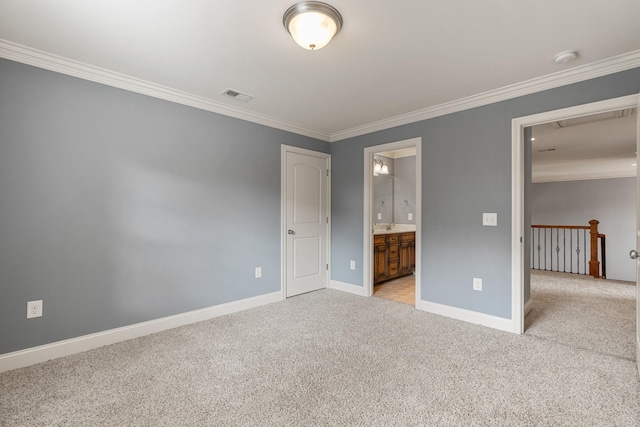 429 Acacia Grove Ln, Lebanon, TN 37087 - unfurnished bedroom featuring ornamental molding, light colored carpet, attic access, and connected bathroom