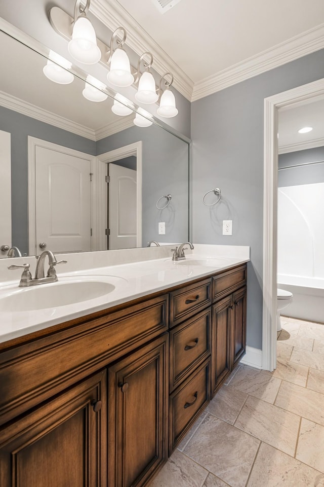 429 Acacia Grove Ln, Lebanon, TN 37087 - bathroom featuring double vanity, stone tile flooring, and ornamental molding