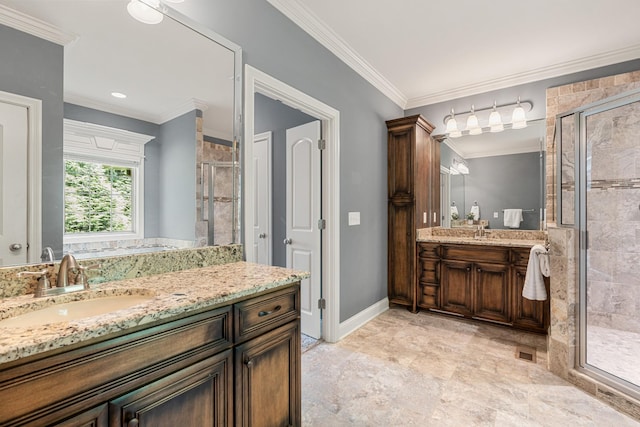 429 Acacia Grove Ln, Lebanon, TN 37087 - bathroom featuring a stall shower, two vanities, and ornamental molding