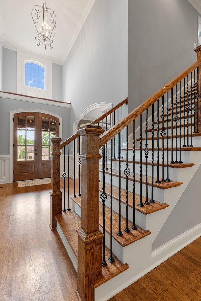 429 Acacia Grove Ln, Lebanon, TN 37087 - entrance foyer featuring ornamental molding, a chandelier, wood finished floors, a towering ceiling, and french doors