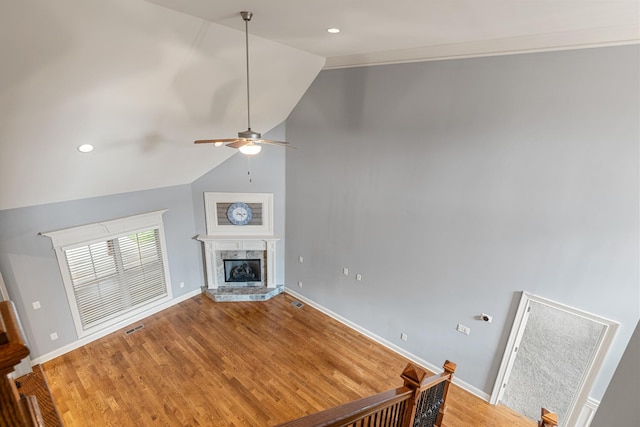 429 Acacia Grove Ln, Lebanon, TN 37087 - unfurnished living room with lofted ceiling, a ceiling fan, light wood-style flooring, a high end fireplace, and recessed lighting