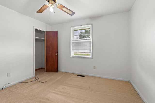 2706 Walnut Ln, Murfreesboro, TN 37129 - unfurnished bedroom with carpet floors, a closet, and a ceiling fan
