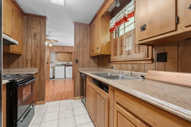 2706 Walnut Ln, Murfreesboro, TN 37129 - kitchen with black electric range, dishwashing machine, independent washer and dryer, under cabinet range hood, and light countertops