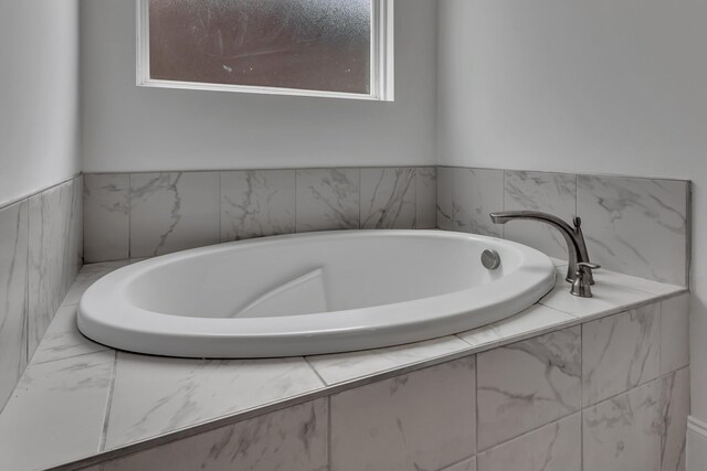 240 Sounder Cir, La Vergne, TN 37086 - full bathroom with a tub with marble appearance