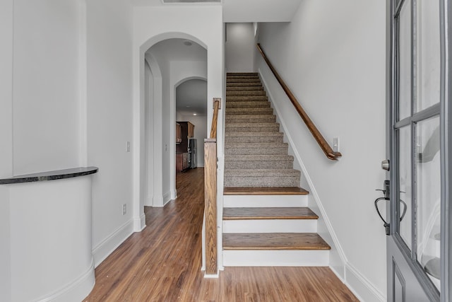 240 Sounder Cir, La Vergne, TN 37086 - stairway featuring wood finished floors and arched walkways