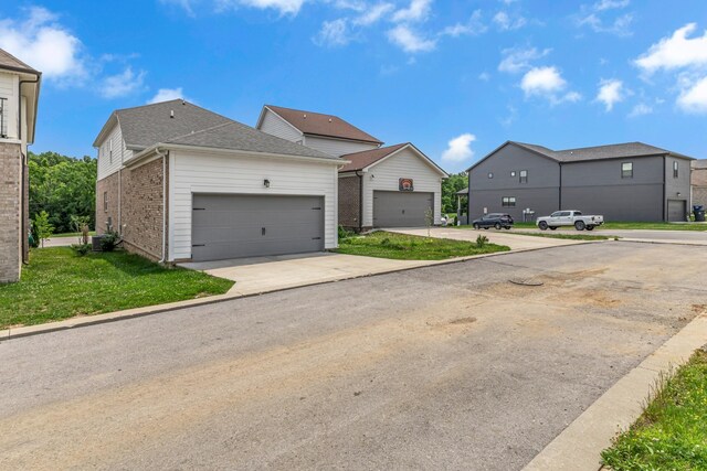 240 Sounder Cir, La Vergne, TN 37086 - view of front of home featuring brick siding and roof with shingles