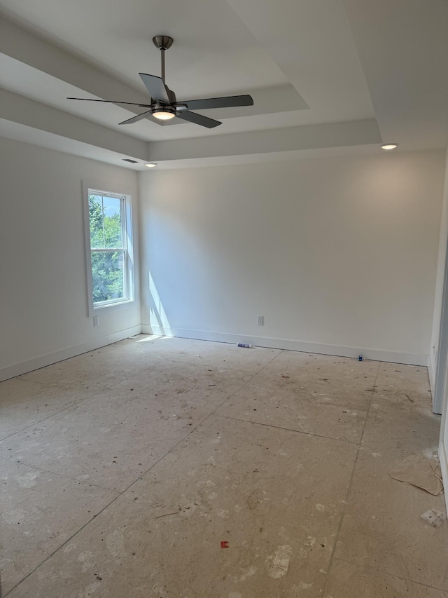 321 Wesson Dr, Clarksville, TN 37043 - spare room featuring a tray ceiling and ceiling fan
