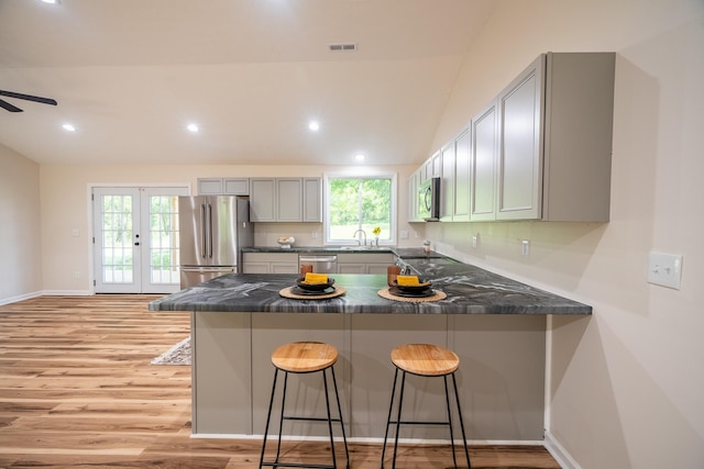 255 Second Creek Rd, Five Points, TN 38457 - kitchen with appliances with stainless steel finishes, gray cabinetry, light wood-type flooring, plenty of natural light, and recessed lighting