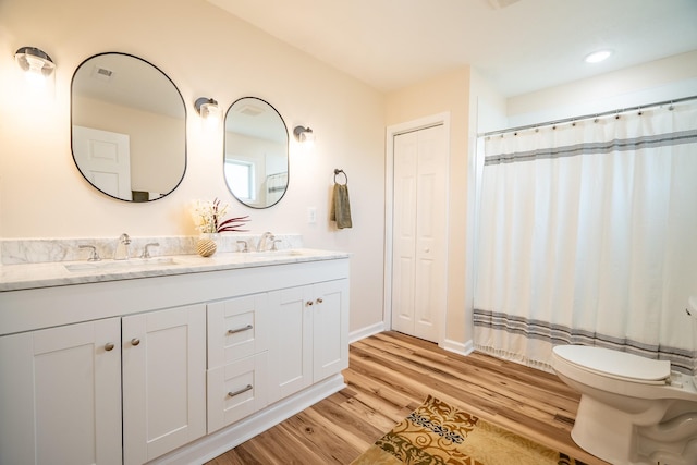255 Second Creek Rd, Five Points, TN 38457 - full bath with double vanity, wood finished floors, a shower with shower curtain, and recessed lighting