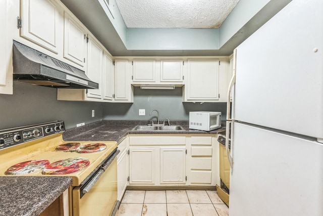 5430 Gatehouse Dr Unit 5430, Memphis, TN 38134 - kitchen featuring white appliances, under cabinet range hood, white cabinets, a textured ceiling, and dark countertops