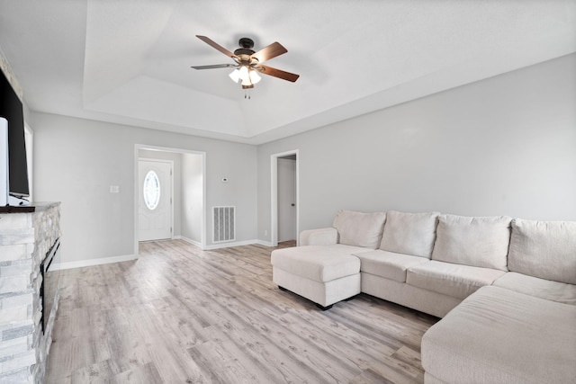 919 Desota Ln, Oak Grove, KY 42262 - living area with a raised ceiling, ceiling fan, and light wood-style flooring