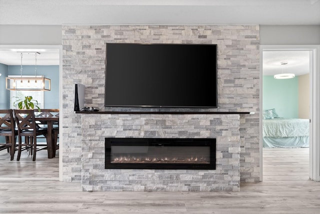 919 Desota Ln, Oak Grove, KY 42262 - detailed view of wood finished floors and a stone fireplace