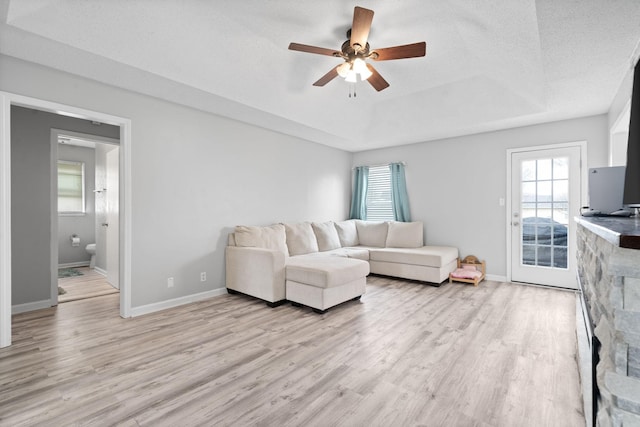 919 Desota Ln, Oak Grove, KY 42262 - living area with light wood finished floors, a ceiling fan, and healthy amount of natural light