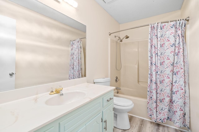 919 Desota Ln, Oak Grove, KY 42262 - full bath with vanity, shower / tub combo with curtain, and wood finished floors
