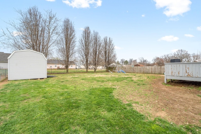 919 Desota Ln, Oak Grove, KY 42262 - view of yard featuring a playground and a storage unit