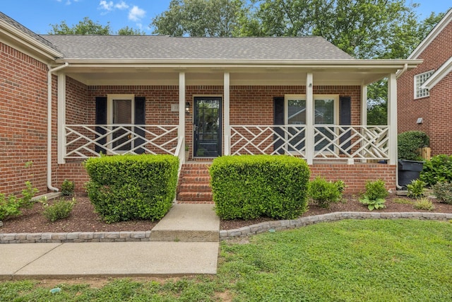 721 Shadowlawn Ct, Franklin, TN 37069 - property entrance featuring covered porch and brick siding