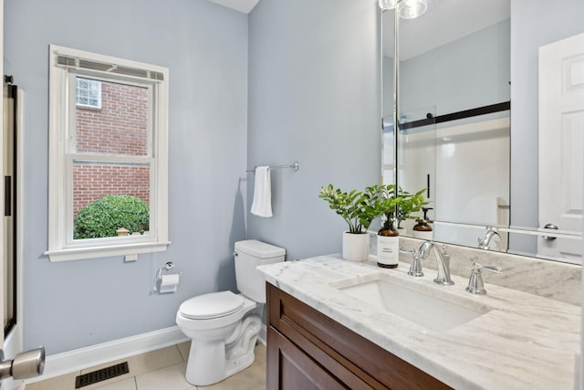 721 Shadowlawn Ct, Franklin, TN 37069 - bathroom featuring tile patterned floors, vanity, a shower with shower door, and healthy amount of natural light