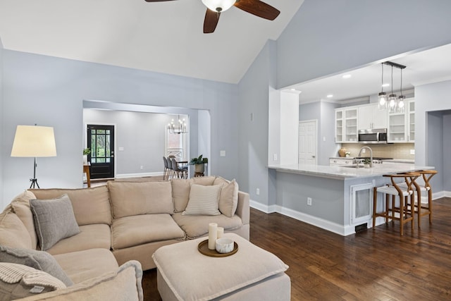 721 Shadowlawn Ct, Franklin, TN 37069 - living room with a chandelier, a ceiling fan, dark wood-style floors, and high vaulted ceiling