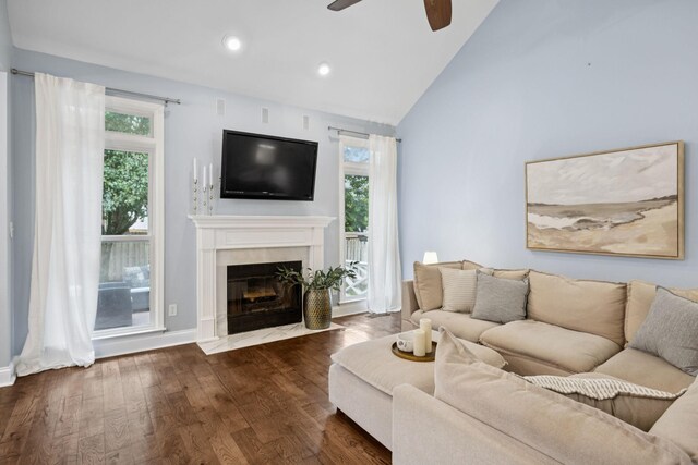 721 Shadowlawn Ct, Franklin, TN 37069 - living room featuring ceiling fan, vaulted ceiling, dark wood finished floors, plenty of natural light, and a tiled fireplace