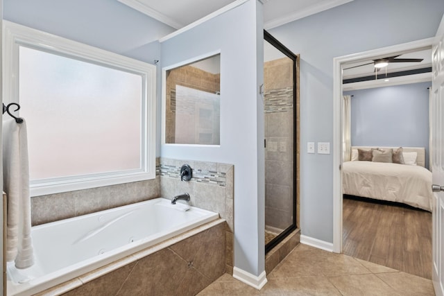 721 Shadowlawn Ct, Franklin, TN 37069 - ensuite bathroom with a tub with jets, a stall shower, tile patterned floors, and ornamental molding