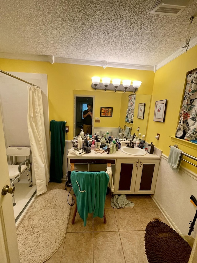 412 Howard Cir, Chattanooga, TN 37411 - full bathroom with a textured ceiling, a shower with curtain, vanity, tile patterned flooring, and ornamental molding
