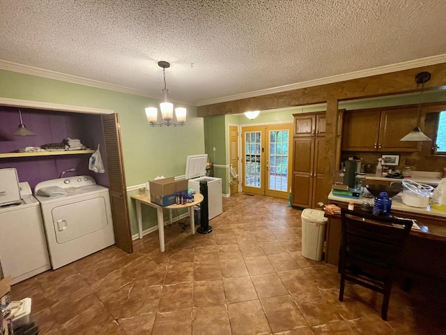412 Howard Cir, Chattanooga, TN 37411 - dining room featuring crown molding, french doors, separate washer and dryer, a chandelier, and a textured ceiling