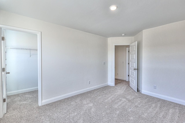 2269 Kai Dr, Murfreesboro, TN 37129 - unfurnished bedroom with light carpet, a spacious closet, and a closet