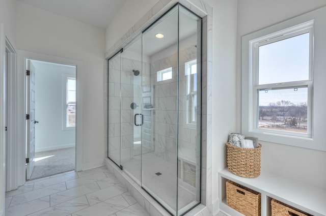 2816 Kai Dr, Murfreesboro, TN 37129 - bathroom featuring plenty of natural light, marble finish flooring, and a stall shower