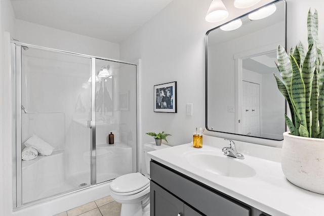 1108 Somerset Springs Dr, Spring Hill, TN 37174 - bathroom featuring vanity, a shower stall, and tile patterned floors