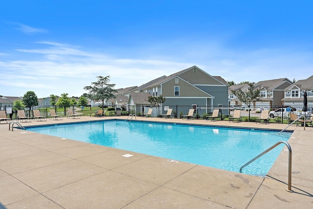 1108 Somerset Springs Dr, Spring Hill, TN 37174 - community pool with a patio area and a residential view