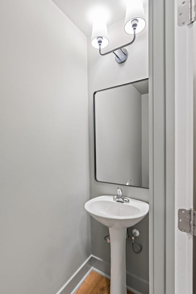 1108 Somerset Springs Dr, Spring Hill, TN 37174 - bathroom with baseboards and wood finished floors