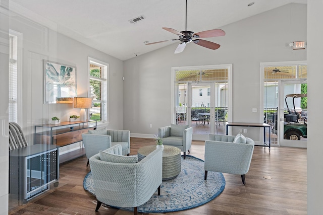 1108 Somerset Springs Dr, Spring Hill, TN 37174 - living room with vaulted ceiling, a ceiling fan, and wood finished floors