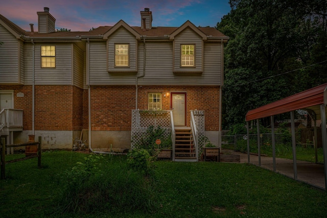 5156 Hunters Point Ln, Hermitage, TN 37076 - back of house featuring brick siding and a chimney