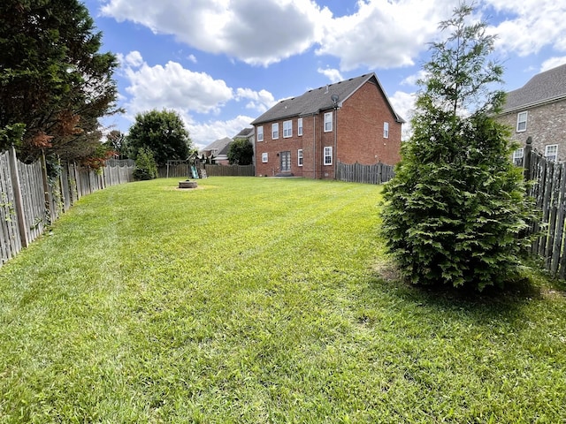 2010 Katach Ct, Spring Hill, TN 37174 - fenced backyard featuring an outdoor fire pit