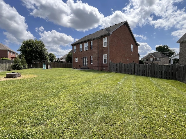 2010 Katach Ct, Spring Hill, TN 37174 - fenced backyard with an outdoor fire pit