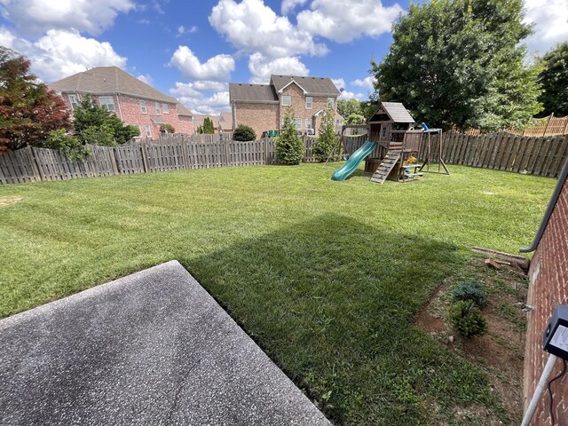 2010 Katach Ct, Spring Hill, TN 37174 - fenced backyard featuring a playground