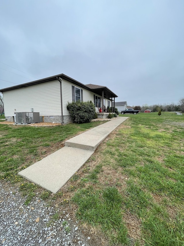 532 Douglas Ln, Lafayette, TN 37083 - view of side of property with a yard and a porch