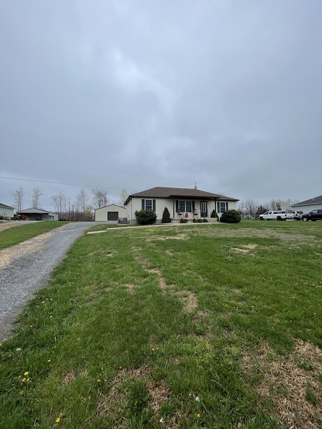 532 Douglas Ln, Lafayette, TN 37083 - ranch-style house featuring gravel driveway and a front lawn
