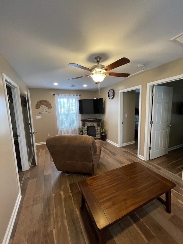 532 Douglas Ln, Lafayette, TN 37083 - living room with ceiling fan, wood finished floors, a fireplace, and recessed lighting