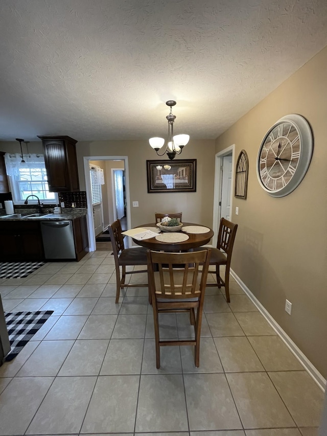 532 Douglas Ln, Lafayette, TN 37083 - dining room featuring a chandelier, a textured ceiling, and light tile patterned flooring