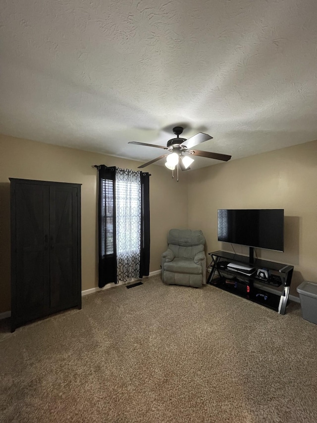 532 Douglas Ln, Lafayette, TN 37083 - living room featuring carpet flooring, ceiling fan, and a textured ceiling