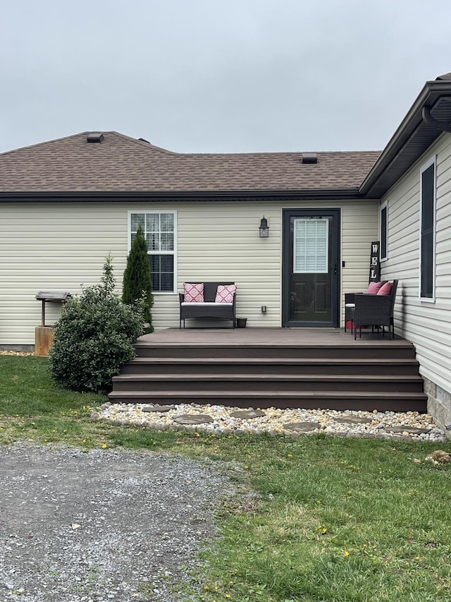 532 Douglas Ln, Lafayette, TN 37083 - back of house featuring a lawn, a deck, a shingled roof, and an outdoor hangout area