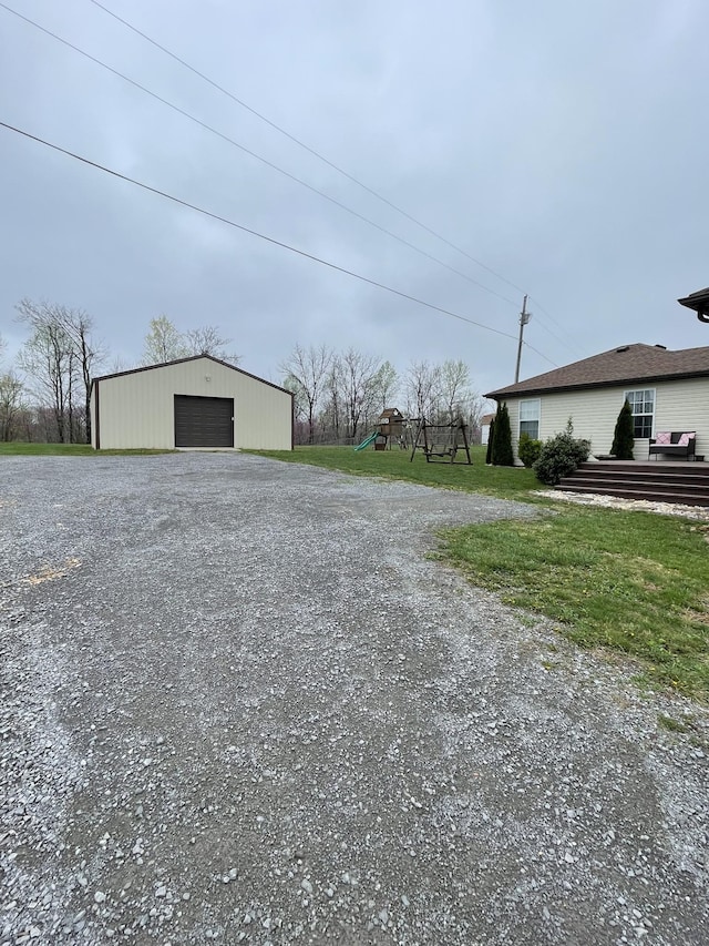 532 Douglas Ln, Lafayette, TN 37083 - detached garage featuring driveway