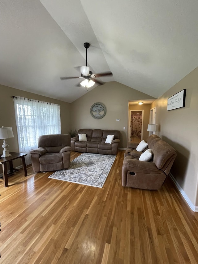 532 Douglas Ln, Lafayette, TN 37083 - living room featuring a ceiling fan, wood finished floors, and lofted ceiling